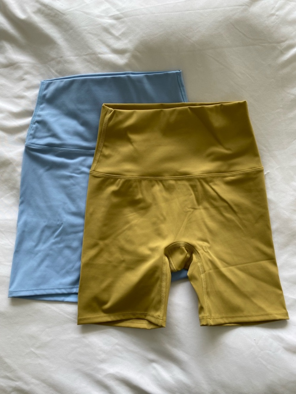 2 pack stretchy workout biker shorts. BRAND NEW. baby blue, mustard.